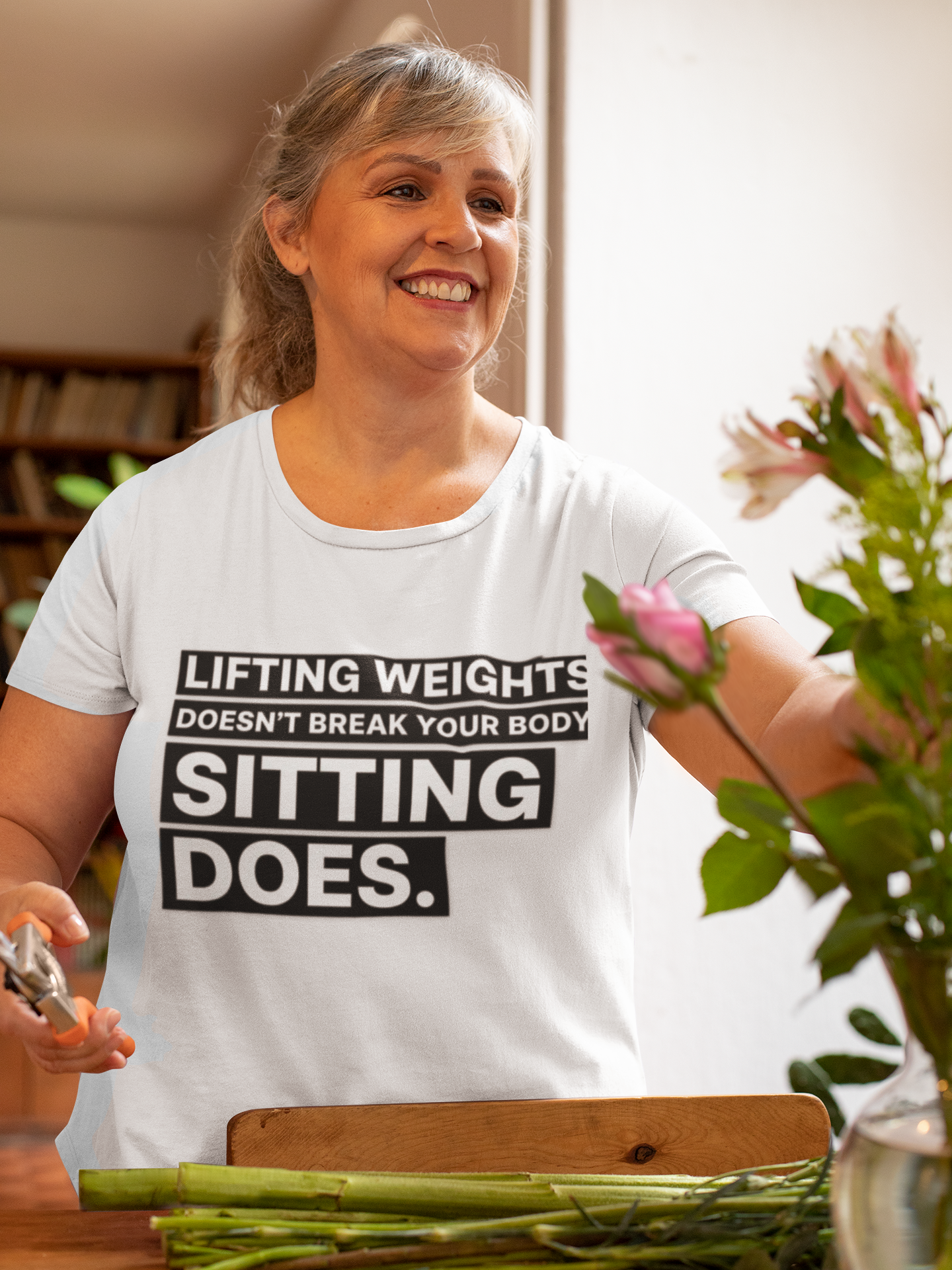 Lifting Weights Doesn’t Break Your Body Sitting Does fitness truth tee supporting posture, back health, and healthy living for beginners