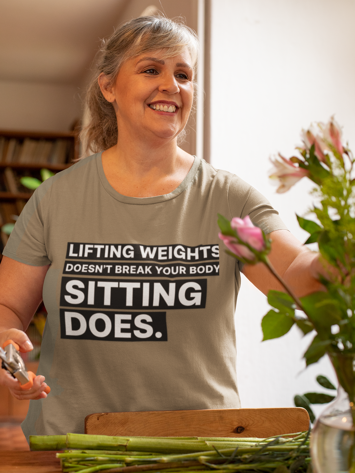 Lifting Weights Doesn’t Break Your Body Sitting Does fitness truth tee supporting posture, back health, and healthy living for beginners