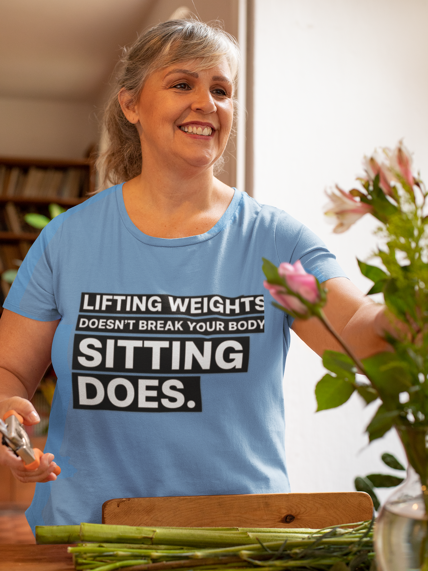 Lifting Weights Doesn’t Break Your Body Sitting Does fitness truth tee supporting posture, back health, and healthy living for beginners