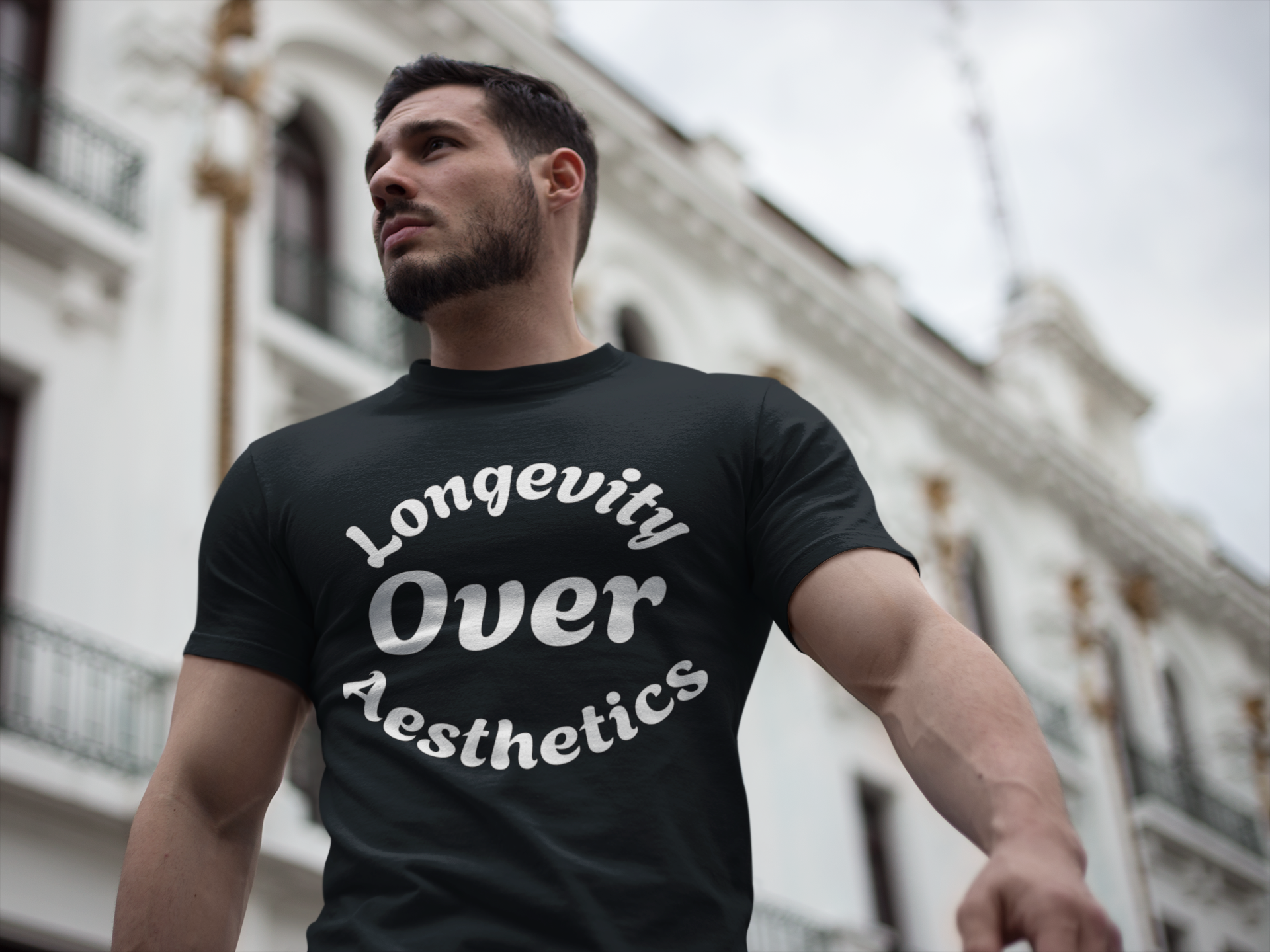 Longevity Over Aesthetics fitness truth tee promoting performance and healthy living for beginners